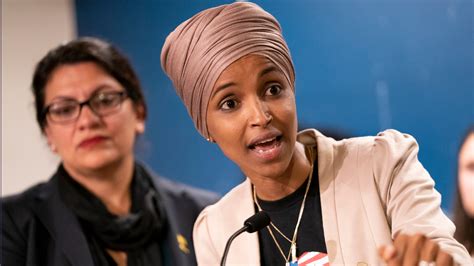 Ilhan Omar Walks Away from Reporter After Police Discover Weapons in Son’s Apartment with Convicted Felon